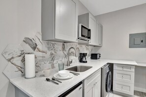 Microwave, coffee/tea maker, toaster, high chair
