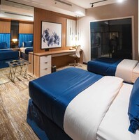 设计双床房 | 高档床上用品、记忆海绵床垫、客房内保险箱、办公桌