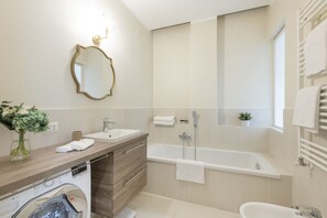 Hair dryer, bidet, towels
