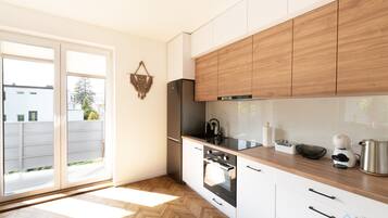 Apartment | Private kitchen | Fridge, microwave, oven, stovetop