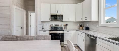 House, 4 Bedrooms | Private kitchen | Fridge, oven, stovetop, coffee/tea maker