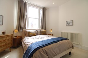 2 slaapkamers, een strijkplank/strijkijzer, wifi, beddengoed