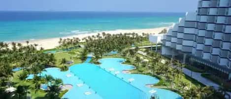 Premier Room, Beach View | Pillowtop beds, in-room safe, desk, blackout drapes