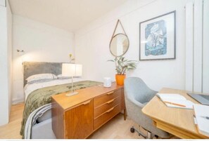 Estudio | 1 dormitorio, tabla de planchar con plancha, wifi gratis y ropa de cama