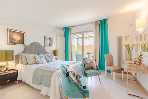 2 quartos, ferros/tábuas de passar roupa, roupa de cama