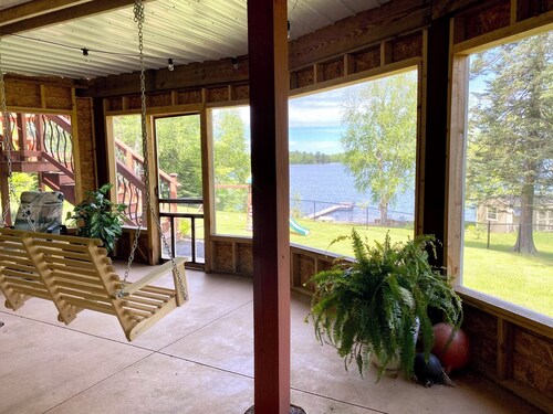 Private sand beach, screen porch, spacious rooms, paddle boards and more!