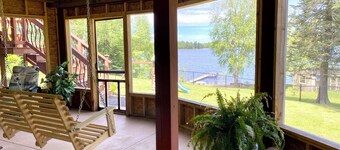 Private sand beach, screen porch, spacious rooms, paddle boards and more!