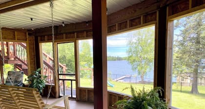 Private sand beach, screen porch, spacious rooms, paddle boards and more!