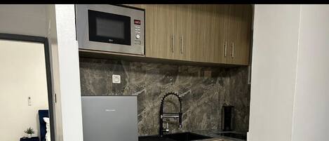 Fridge, microwave, oven, coffee/tea maker