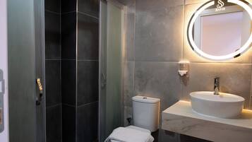 Eco-friendly toiletries, hair dryer, towels, soap