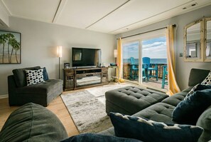 TV, fireplace - Direct Ocean Ocean View and Best Mid-Island Location, Beach Gear Provided (Tybee Island)