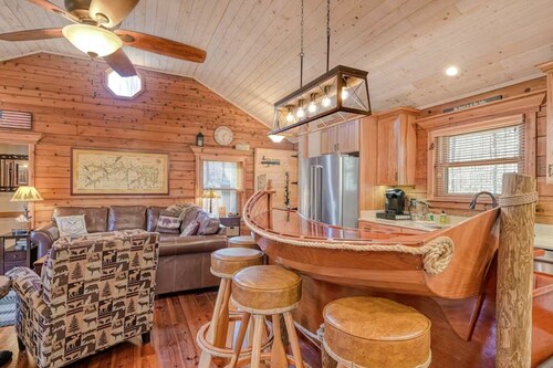 Cozy Bear Cabin provides lakeside living, boathouse bar and  yes....pickle ball.