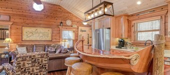 Cozy Bear Cabin provides lakeside living, boathouse bar and  yes....pickle ball.