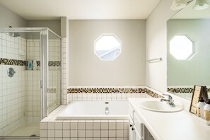Shower, hair dryer, towels, soap