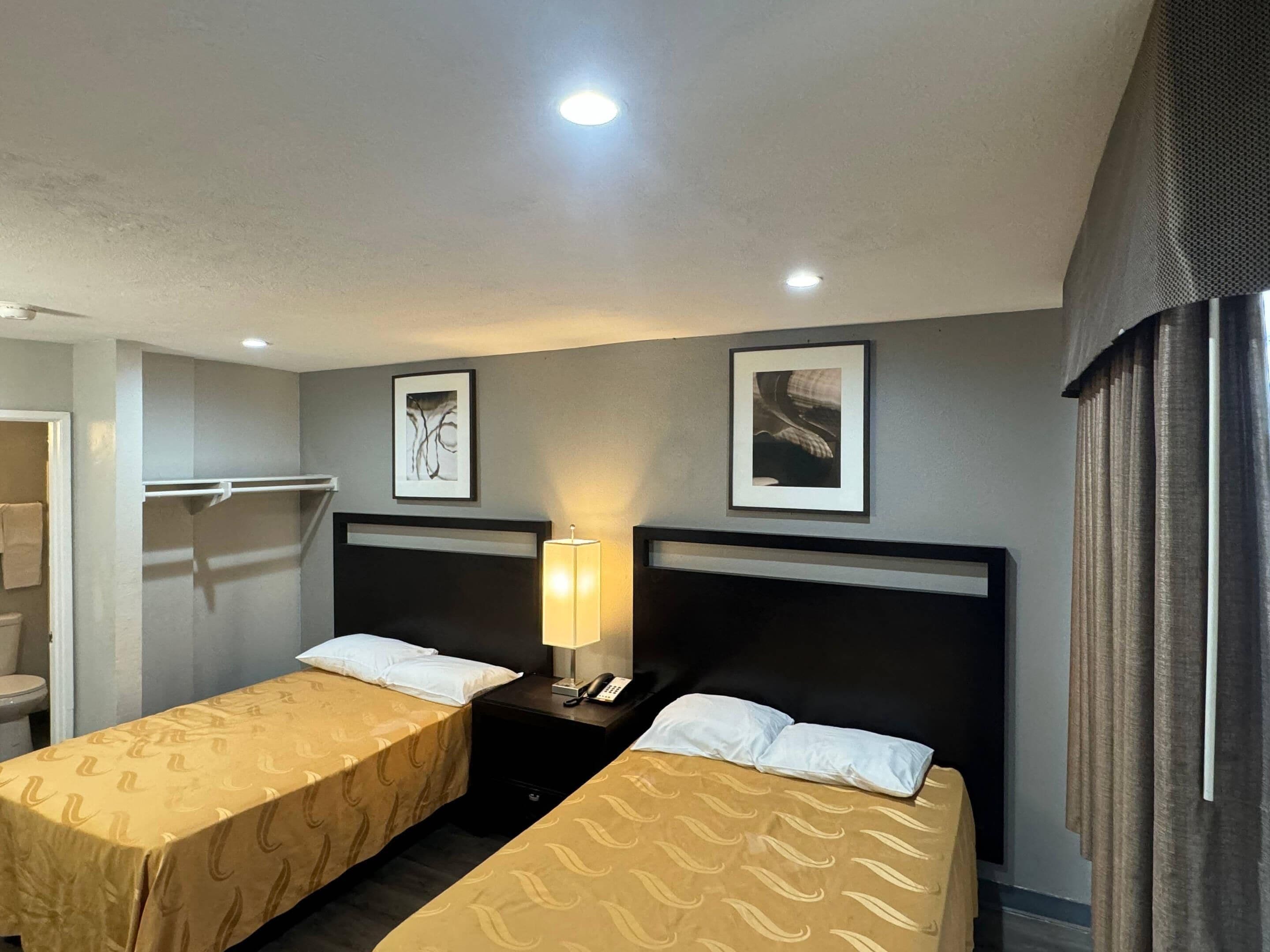 Standard Room, 2 Double Beds, Non Smoking | Individually furnished, desk, free WiFi, bed sheets