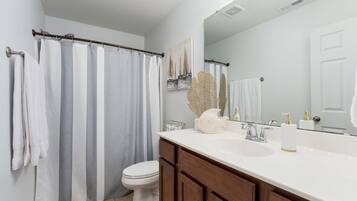 Hair dryer, towels, soap, shampoo