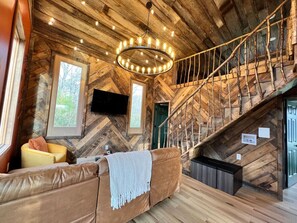 Smart TV, fireplace, books, offices