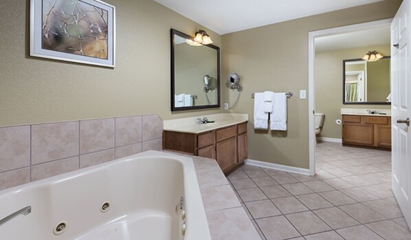 Shower, jetted tub, hair dryer, towels