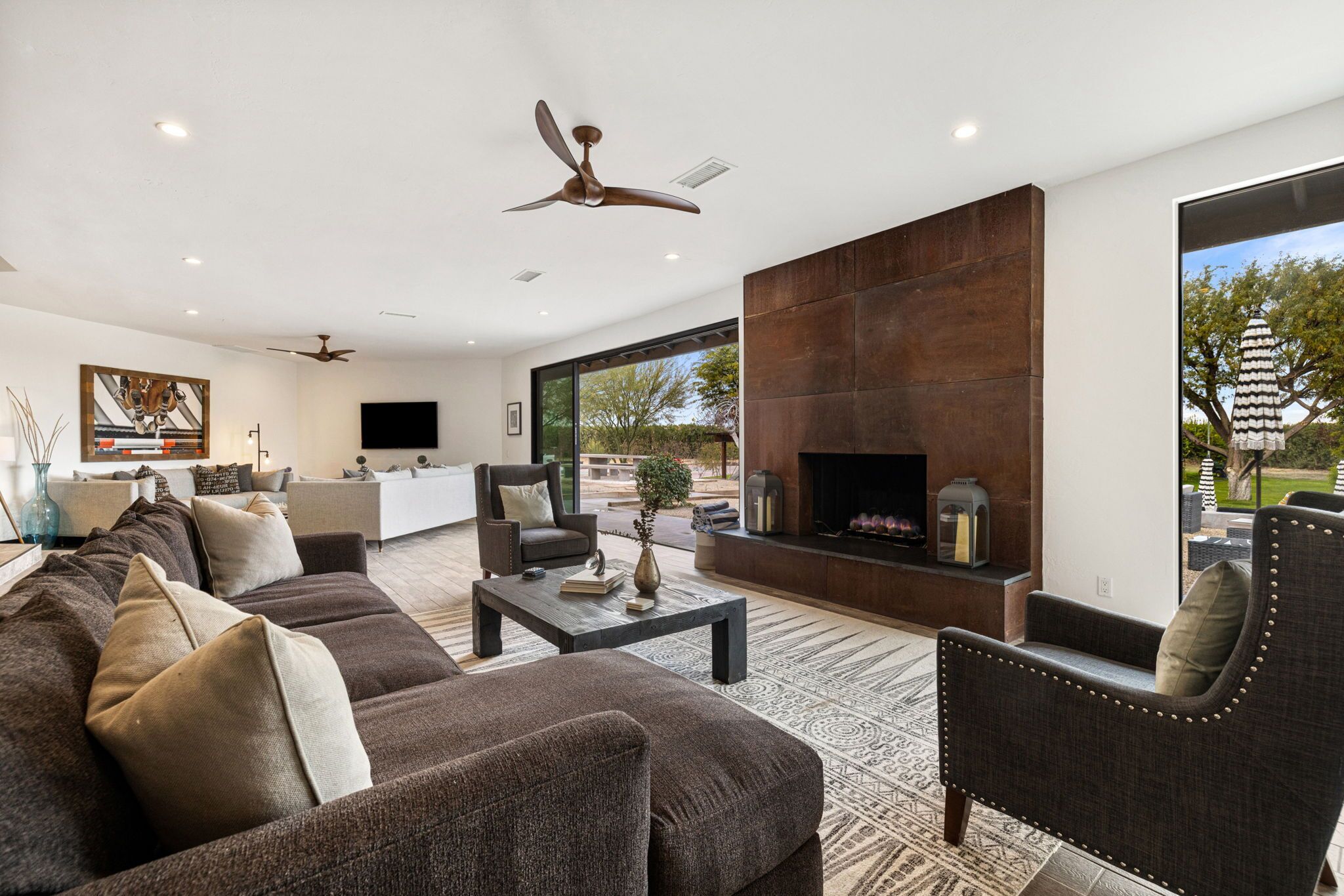 Rally your group around this central steel clad fireplace 