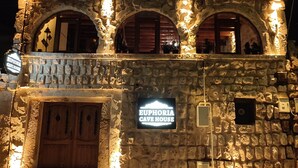 A stone building with a sign reading "Euphorbia Cave House". - Euphoria Cave House (Nevsehir)