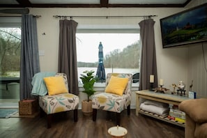 Smart TV, fireplace, books, offices