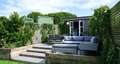 A peaceful and centrally-located Own space in rear of garden with own entrance.