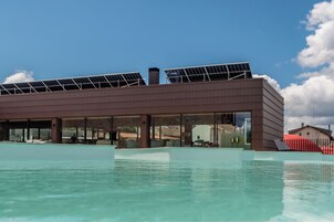 Outdoor pool, open 10:00 AM to 6:00 PM, pool umbrellas, sun loungers