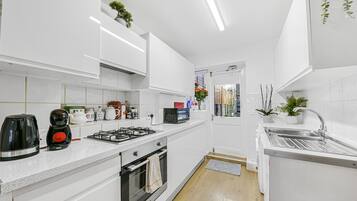 Apartment | Private kitchen | Fridge, microwave, oven, stovetop