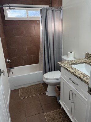 Hair dryer, towels, soap, toilet paper