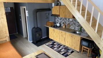 Fridge, microwave, stovetop, coffee/tea maker