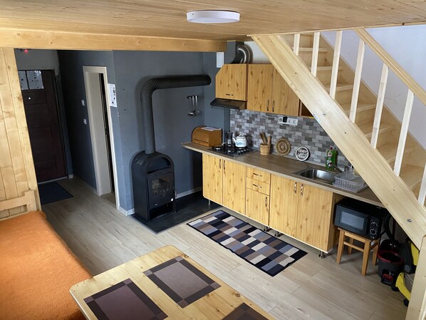 Fridge, microwave, stovetop, coffee/tea maker