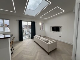 Luxury Studio Suite, 1 King Bed, Ensuite, City View | Premium bedding, memory foam beds, blackout drapes, iron/ironing board