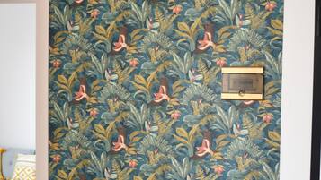 Exclusive Apartment | Living area | 43-inch Smart TV with digital channels, heated floors