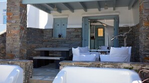 Outdoor dining - Stylish house next to a secluded beach offering amazing sunset views  (Kea)
