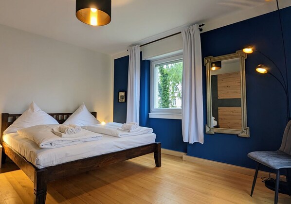 1 bedroom, desk, iron/ironing board, travel cot
