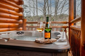 Outdoor spa tub - Downtown Pigeon Forge: Modern indoor pool cabin (Pigeon Forge)