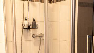 Hair dryer, slippers, towels, soap