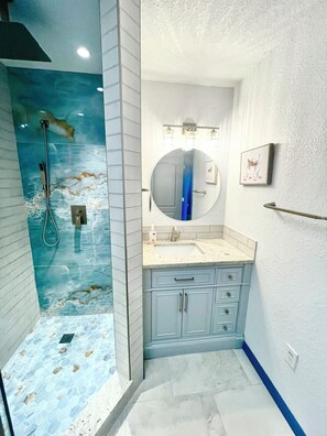 Shower, hair dryer, towels, soap