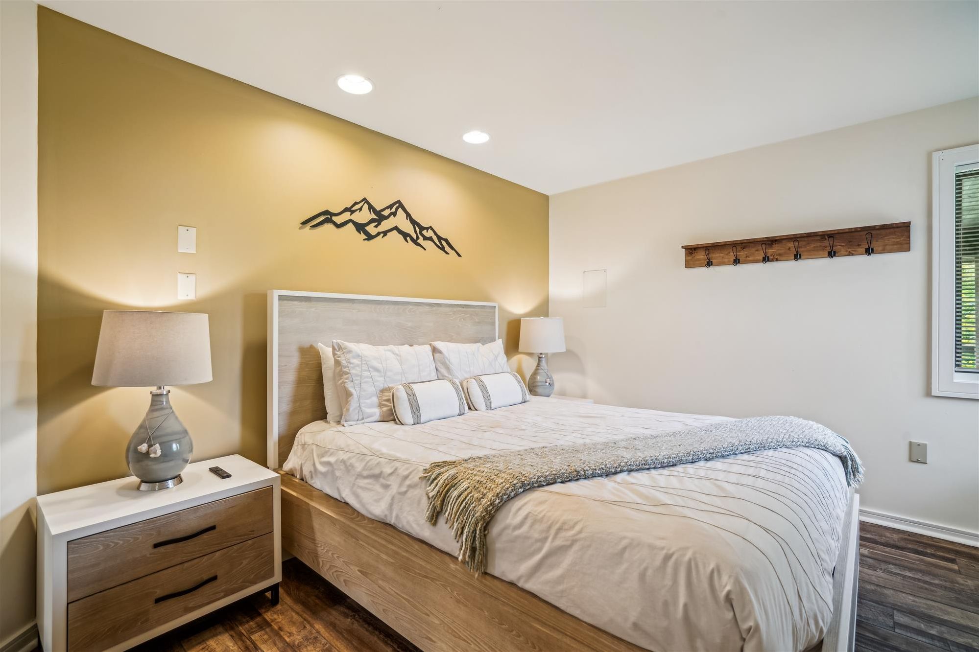 Drift Off in Comfort - This inviting king bedroom offers a peaceful retreat after a full day of mountain adventures.