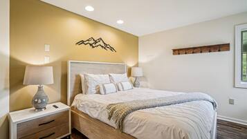 Drift Off in Comfort - This inviting king bedroom offers a peaceful retreat after a full day of mountain adventures.