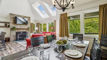 Dinner with a View - Large windows, skylights, and an open layout create a bright setting for every meal.