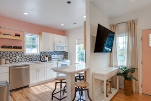 Fridge, microwave, oven, stovetop - A cozy home and garden cottage situated across from million dollar homes. (Raleigh)