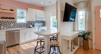 A cozy home and garden cottage situated across from million dollar homes.