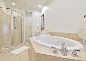 Shower, jetted tub, bidet, towels