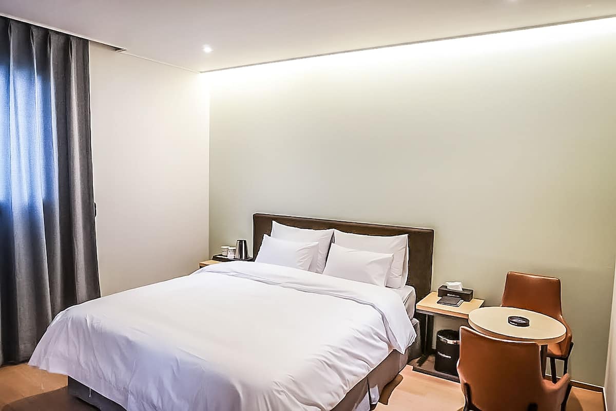 1 habitación y ropa de cama de alta calidad