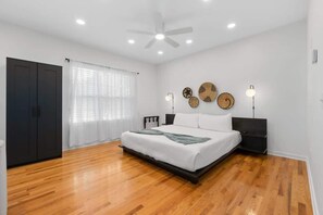 1 bedroom, desk, iron/ironing board, travel crib