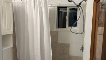 Hair dryer, towels, soap, shampoo