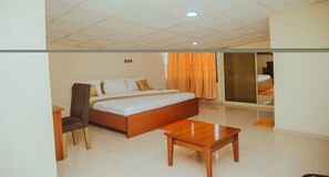 1 bedroom, desk, laptop workspace, bed sheets
