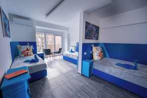 Standard-Dreibettzimmer (ERIDAN) | Zimmersafe, Schreibtisch, kostenloses WLAN