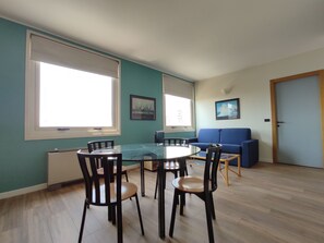 Business Apartment | Living area | 28-inch LCD TV with digital channels, fireplace - Genova Business Homes (Genoa)